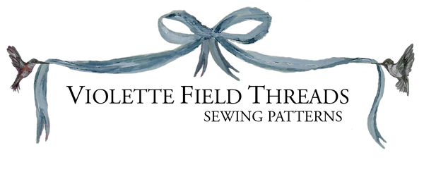 Violette Field Threads logo