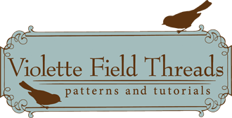 Violette Field Threads logo
